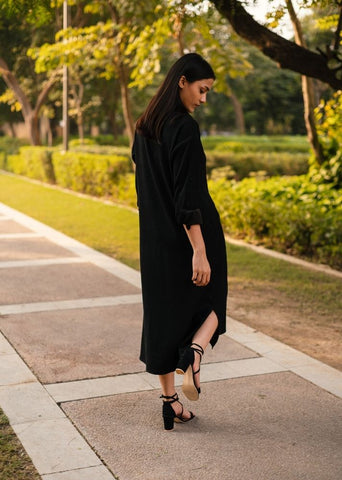 A Model Wearing Black Wool Black Zinniadress , curated by Only Ethikal