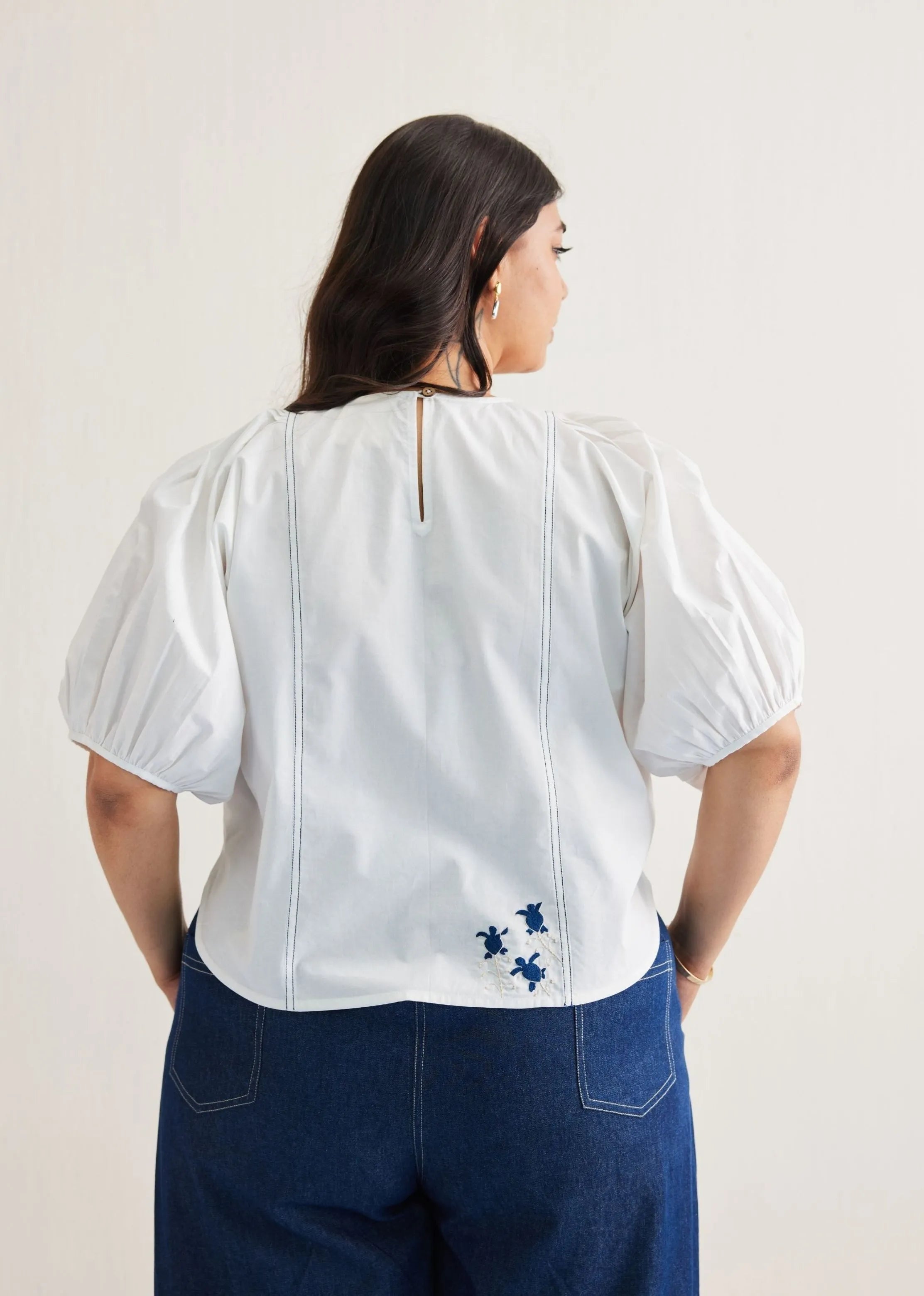 A Model Wearing White Organic Cotton Sea Breeze Organic Cotton White Top, curated by Only Ethikal