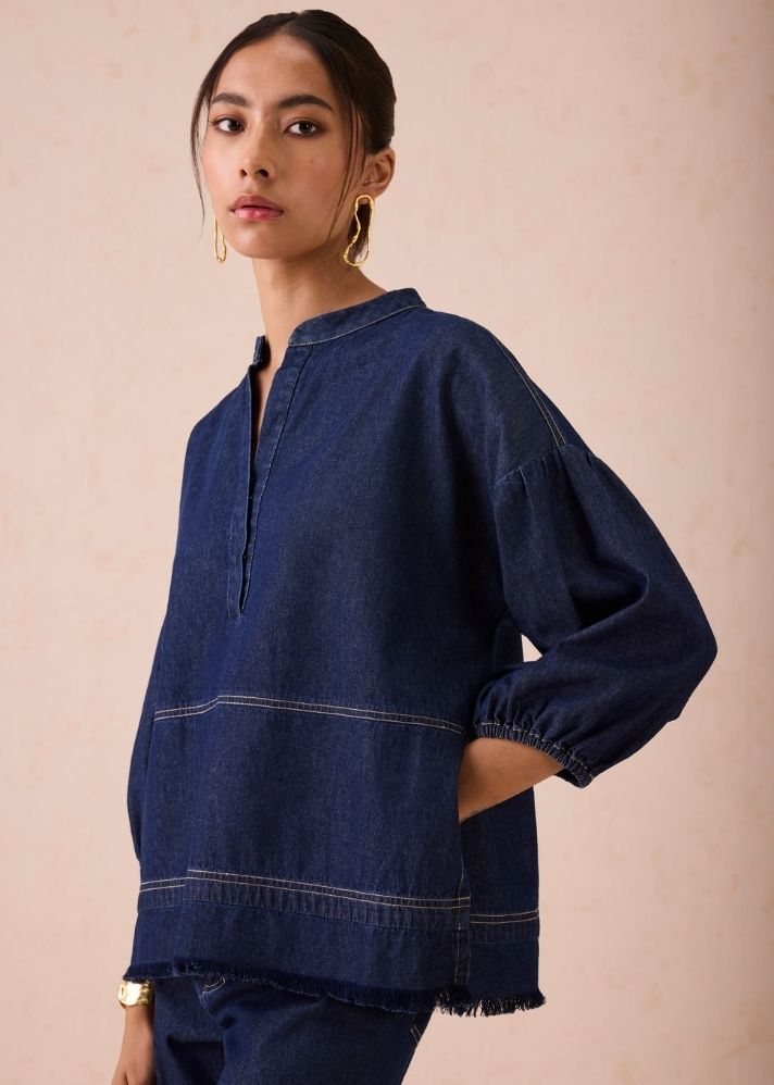 A Model Wearing Blue Denim The Little Things Denim Blouse, curated by Only Ethikal