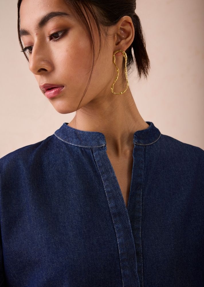 A Model Wearing Blue Denim The Little Things Denim Blouse, curated by Only Ethikal
