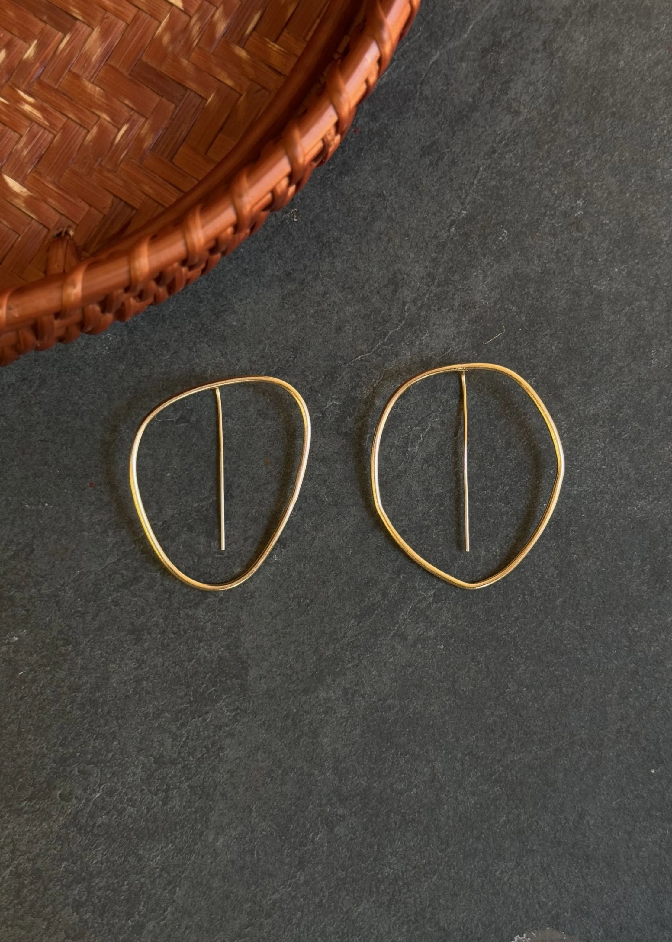 A Model Wearing Gold 18k Gold plated over brass Gold Na-Gyen Tongpa Nyi Earrings, curated by Only Ethikal