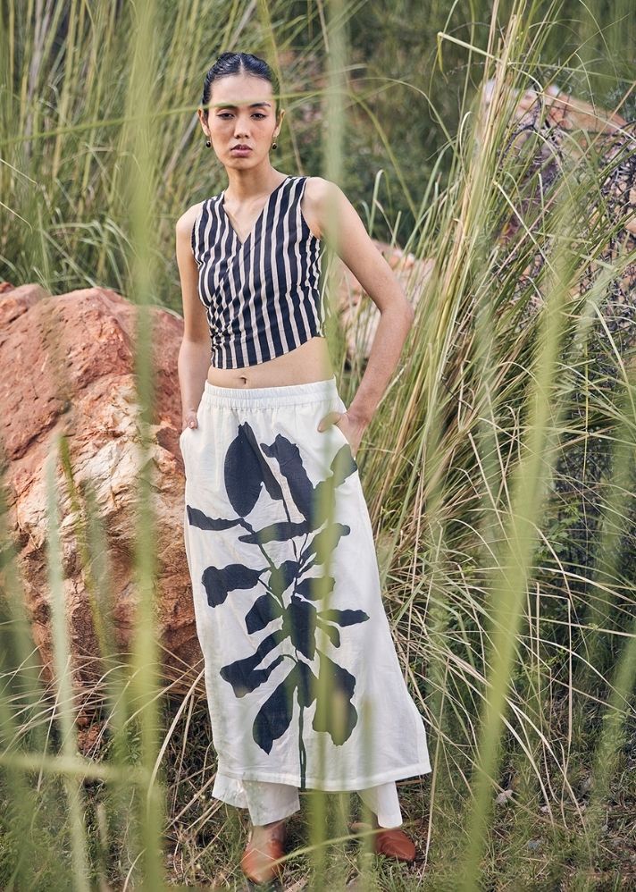 A Model Wearing White Pure Cotton Never-Ending Skirt Trouser curated by Only Ethikal