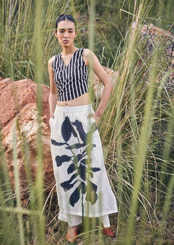 A Model Wearing White Pure Cotton Never-Ending Skirt Trouser curated by Only Ethikal