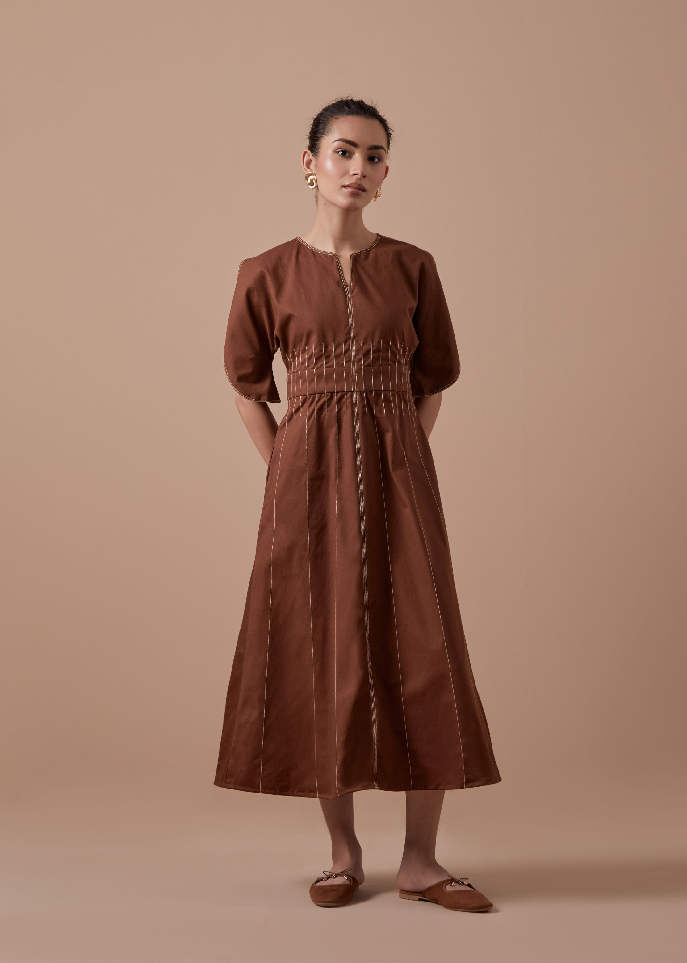 A Model Wearing Brown Organic Cotton Brown Sole Dress, curated by Only Ethikal