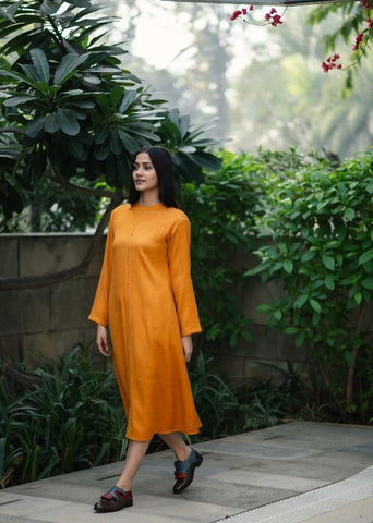 A Model Wearing Yellow Wool Yellowstarflowerdress , curated by Only Ethikal