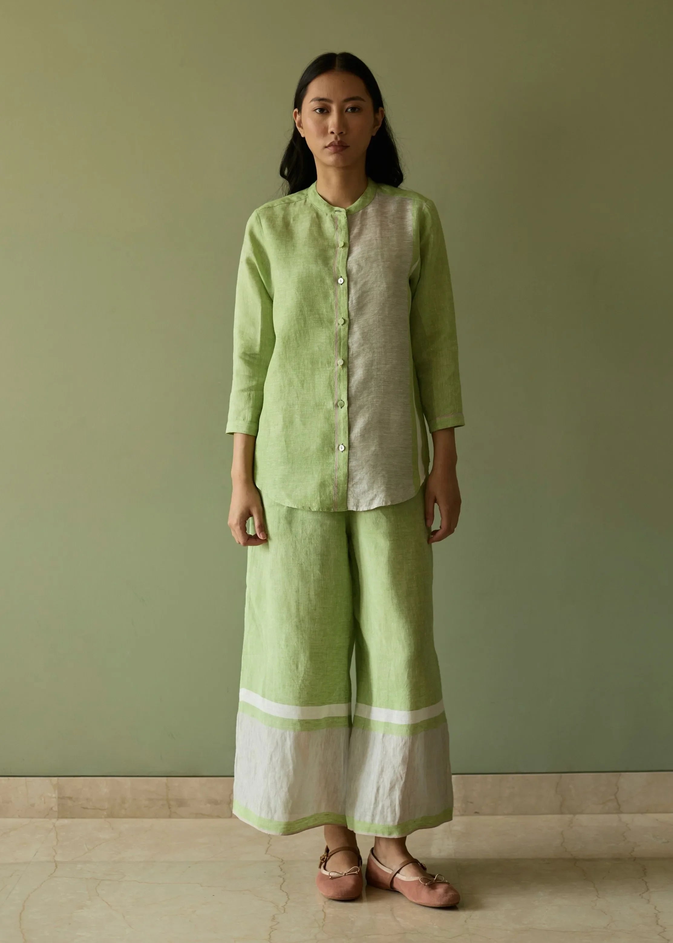 A Model Wearing Green Linen Aline Mandarin Collar Border Linen Shirt- Meadow, curated by Only Ethikal
