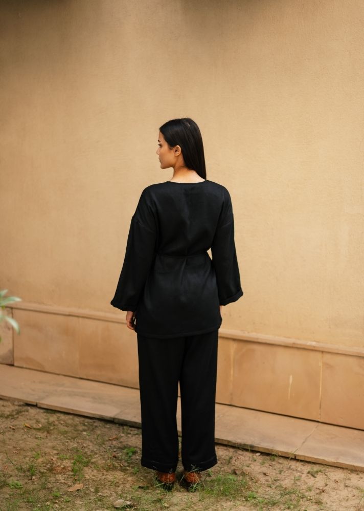 A Model Wearing Black Wool Pansy Top- Black , curated by Only Ethikal