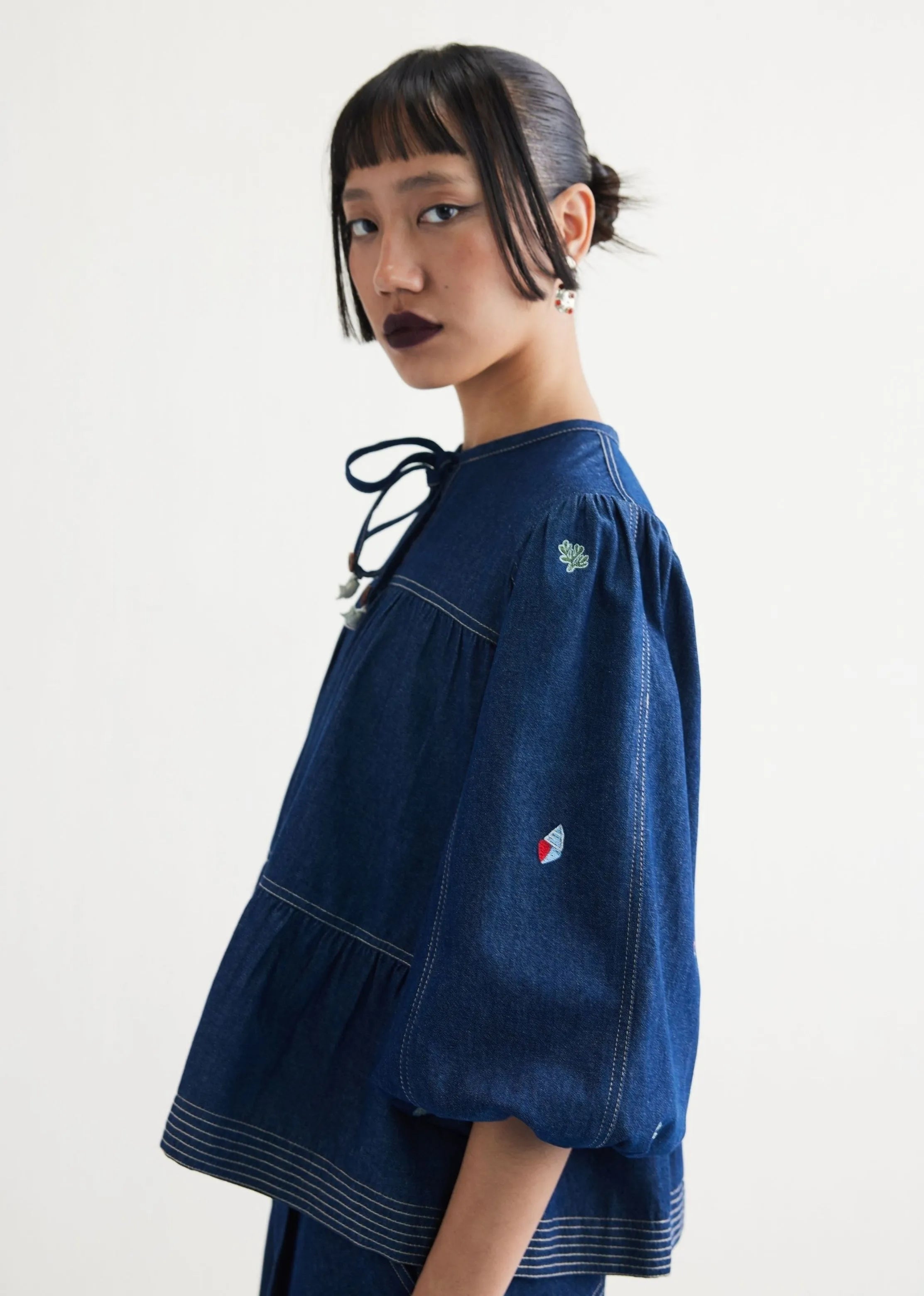 A Model Wearing Blue Cotton Denim Deep Sea Sustainable Denim Blue Top, curated by Only Ethikal