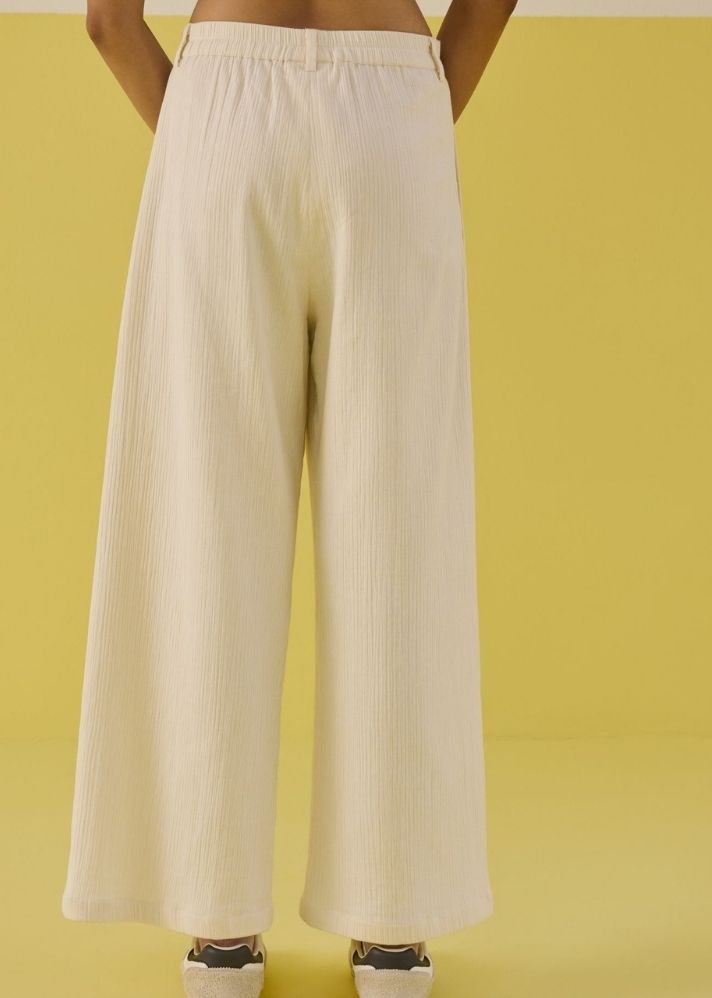 A Model Wearing Organic Cotton Sunshine Organic Cotton Trousers, curated by Only Ethikal