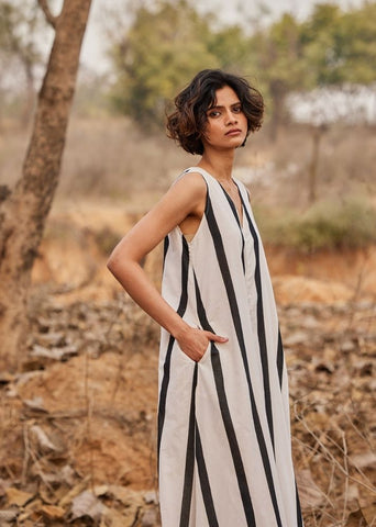 A Model Wearing White Cotton Mul PatioJumpsuit,curated by Only Ethikal