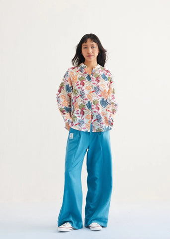 A Model Wearing White Lyocell Blooming Reef Lyocell Classic White Shirt, curated by Only Ethikal