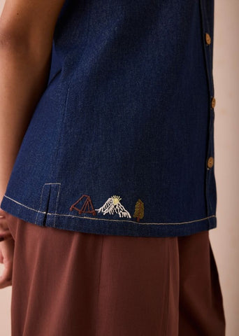 A Model Wearing Blue Denim The Mountain Denim Sleevless Shirt, curated by Only Ethikal