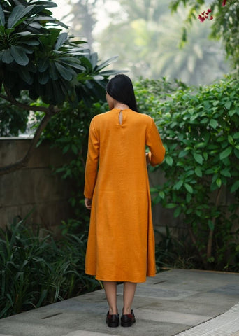 A Model Wearing Yellow Wool Yellowstarflowerdress , curated by Only Ethikal