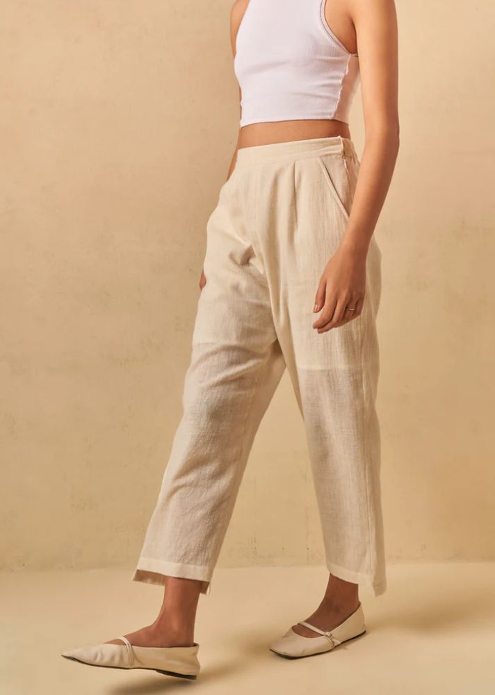 A Model Wearing Beige Organic Cotton The Holiday handwoven trousers, curated by Only Ethikal