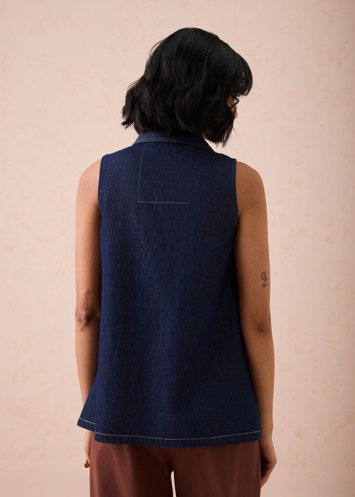 A Model Wearing Blue Denim The Mountain Denim Sleevless Shirt, curated by Only Ethikal