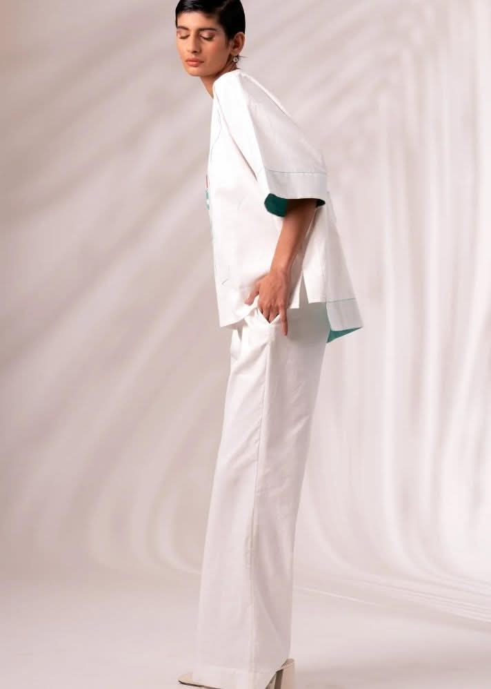 A Model Wearing White Cotton Twill Gina Pant, curated by Only Ethikal
