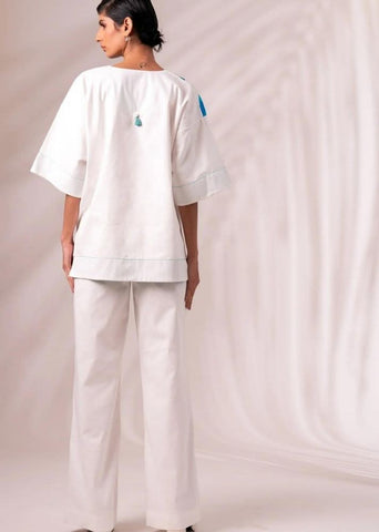 A Model Wearing White Cotton Twill Gina Pant, curated by Only Ethikal