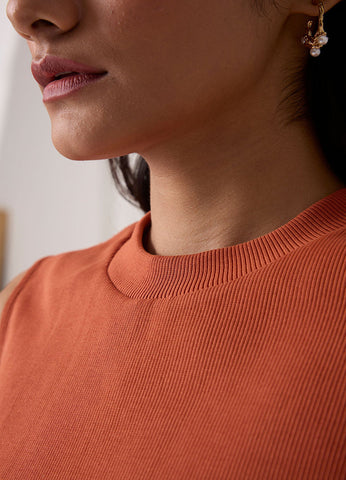A Model Wearing Orange Organic Cotton Iga Orange Cotton Tank Top , curated by Only Ethikal