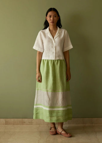 A Model Wearing Green Linen Ora Pleated Border Linen Skirt- Meadow, curated by Only Ethikal