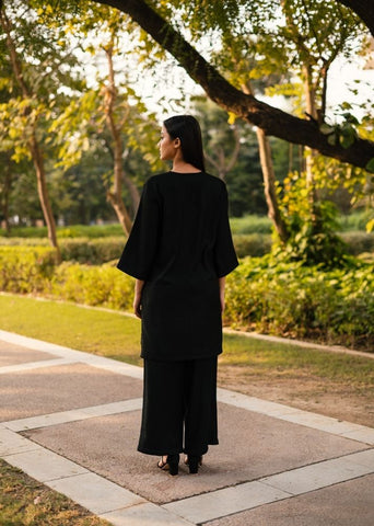 A Model Wearing Black Wool Dark Dimension Set, curated by Only Ethikal