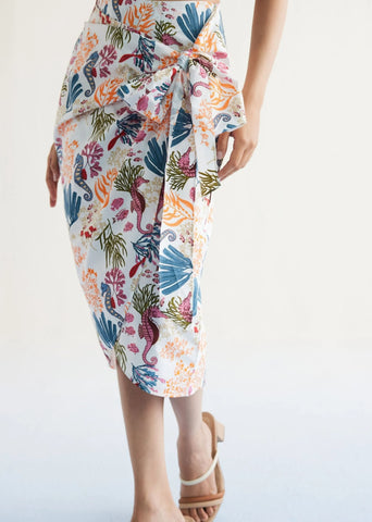 A Model Wearing White Organic Cotton Blooming Reef Cotton White Wrap Skirt, curated by Only Ethikal