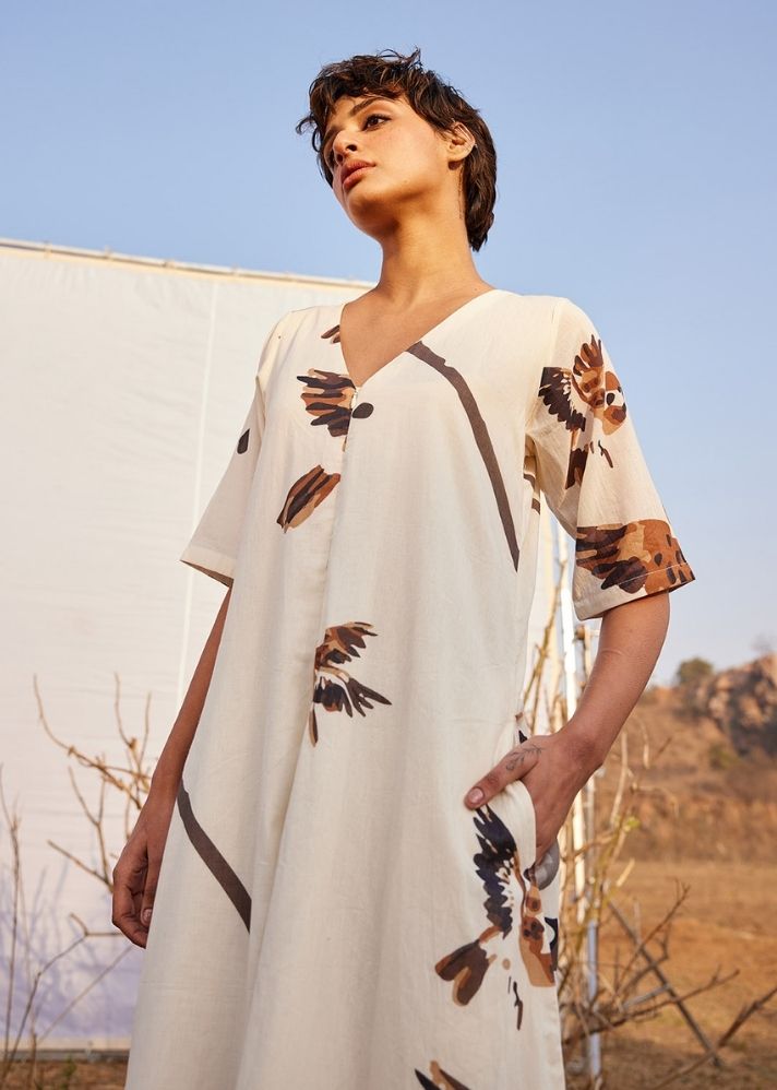 A Model Wearing White Cotton Mul GhironiJumpsuit,curated by Only Ethikal