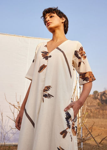 A Model Wearing White Cotton Mul GhironiJumpsuit,curated by Only Ethikal
