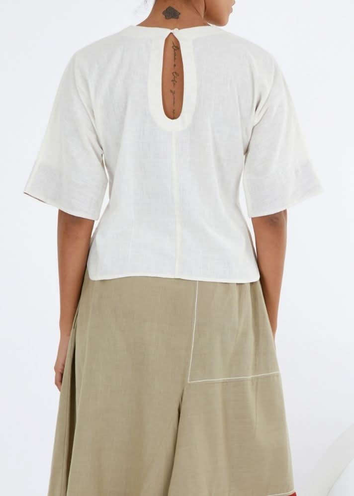A Model Wearing White Pure Cotton Ivory Crop Top Natural White Top, curated by Only Ethikal