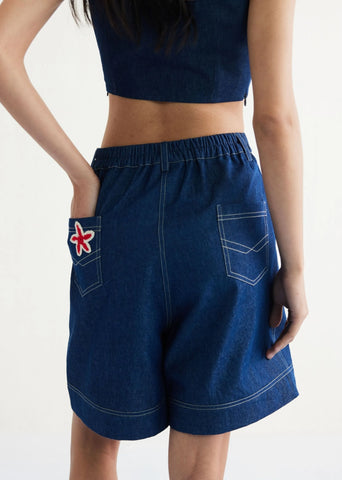 A Model Wearing Blue Cotton Denim Deepwater Sustainable Denim Blue Shorts, curated by Only Ethikal