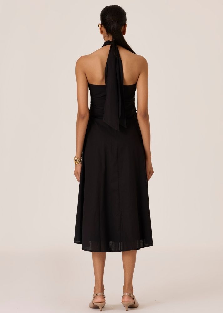 A Model Wearing Black Organic Cotton Samaria Black Halter Dress , curated by Only Ethikal