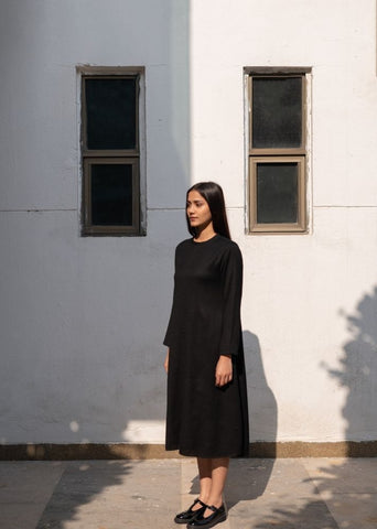 A Model Wearing Black Wool Black Starflowerdress , curated by Only Ethikal