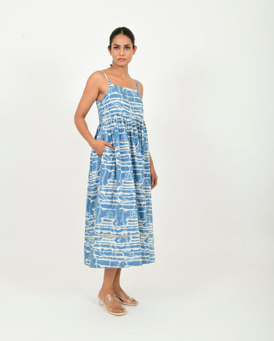 A Model Wearing Blue Organic Cotton Indigo Splash Gather Dress , curated by Only Ethikal