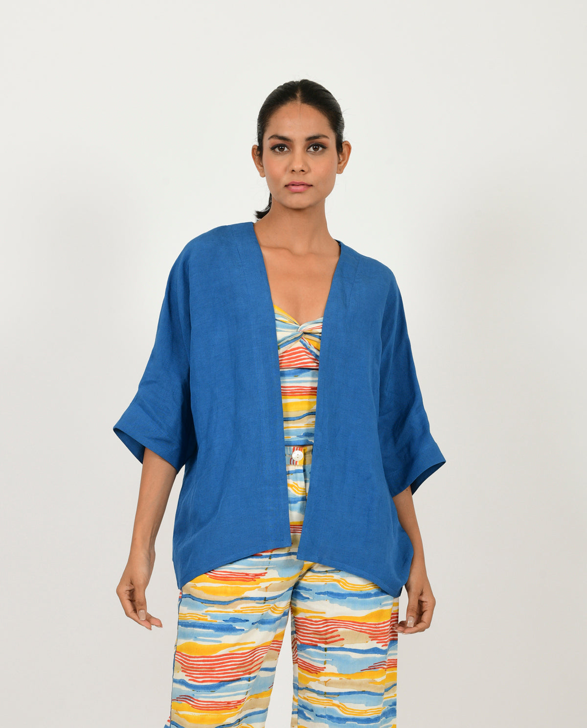 A Model Wearing Blue Organic Cotton Classic Blue Linen Overlay , curated by Only Ethikal