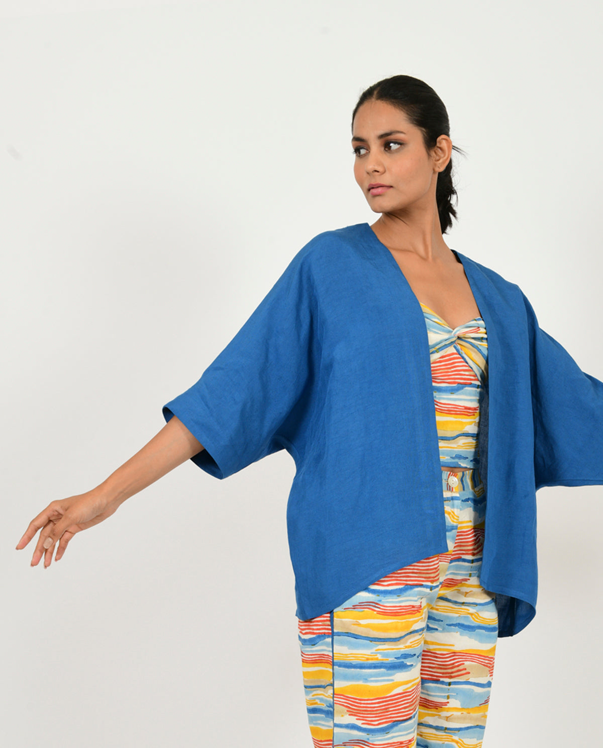 A Model Wearing Blue Organic Cotton Classic Blue Linen Overlay , curated by Only Ethikal