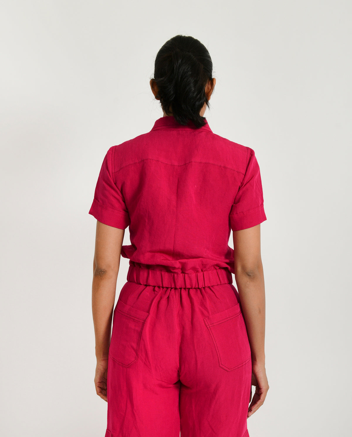 A Model Wearing Pink Organic Cotton Viva Magenta Linen Crop Top , curated by Only Ethikal