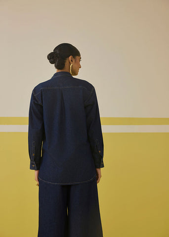 A Model Wearing Organic Cotton Denim Grow With A Flow Denim Shirt , curated by Only Ethikal