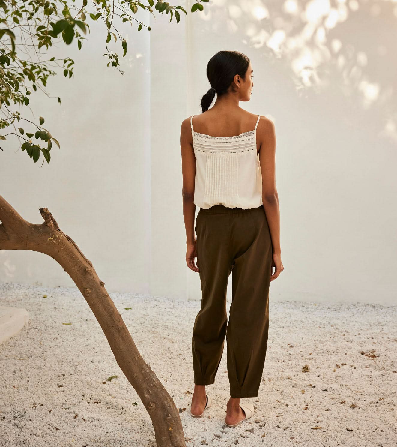 A Model Wearing White Pure Cotton Olive Dreams Trouser curated by Only Ethikal
