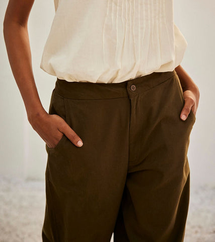A Model Wearing White Pure Cotton Olive Dreams Trouser curated by Only Ethikal