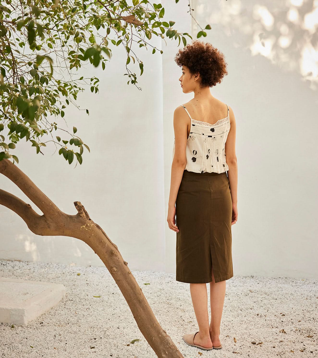 A Model Wearing Multicolor,Pure Cotton Olive Pencil Skirt curated by Only Ethikal