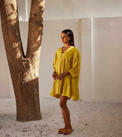 A Model Wearing Yellow Pure Cotton Marigold Dress curated by Only Ethikal