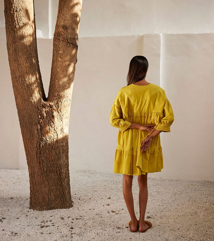 A Model Wearing Yellow Pure Cotton Marigold Dress curated by Only Ethikal