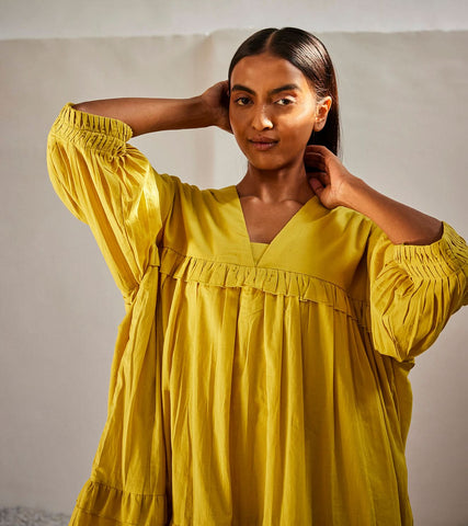 A Model Wearing Yellow Pure Cotton Marigold Dress curated by Only Ethikal