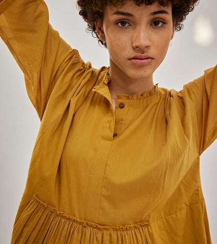 A Model Wearing Yellow Pure Cotton Love Burns Dress curated by Only Ethikal
