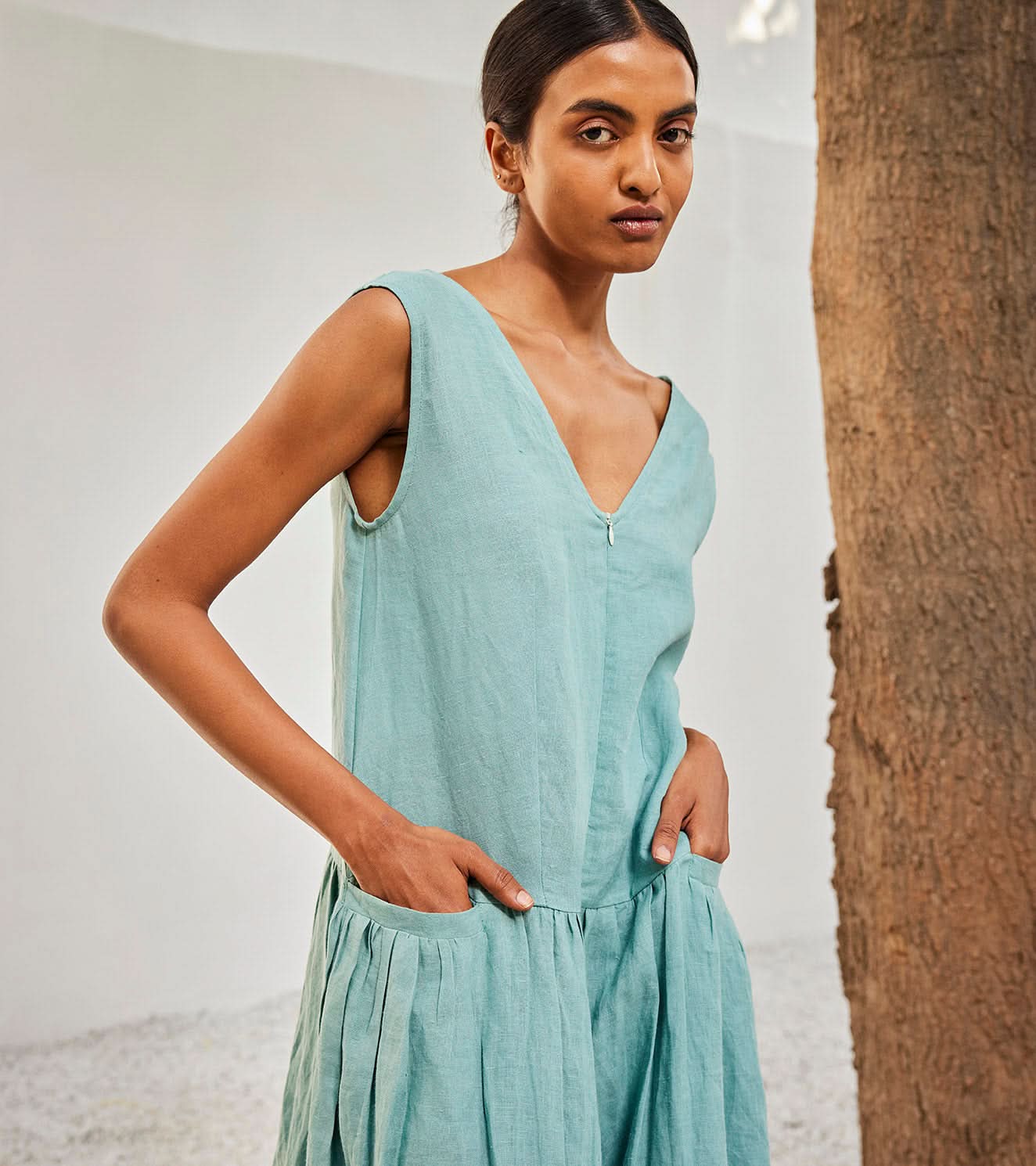 A Model Wearing Blue Linen Morning SkyJumpsuit,curated by Only Ethikal