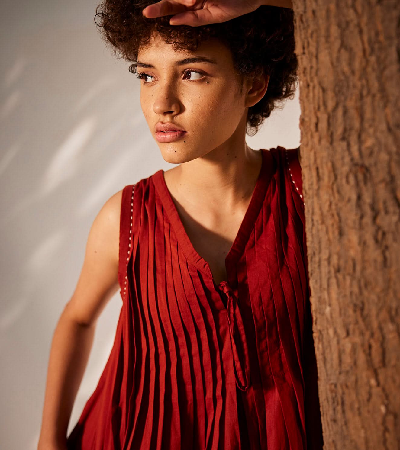 A Model Wearing Red Pure Cotton Rose Vine Dress curated by Only Ethikal