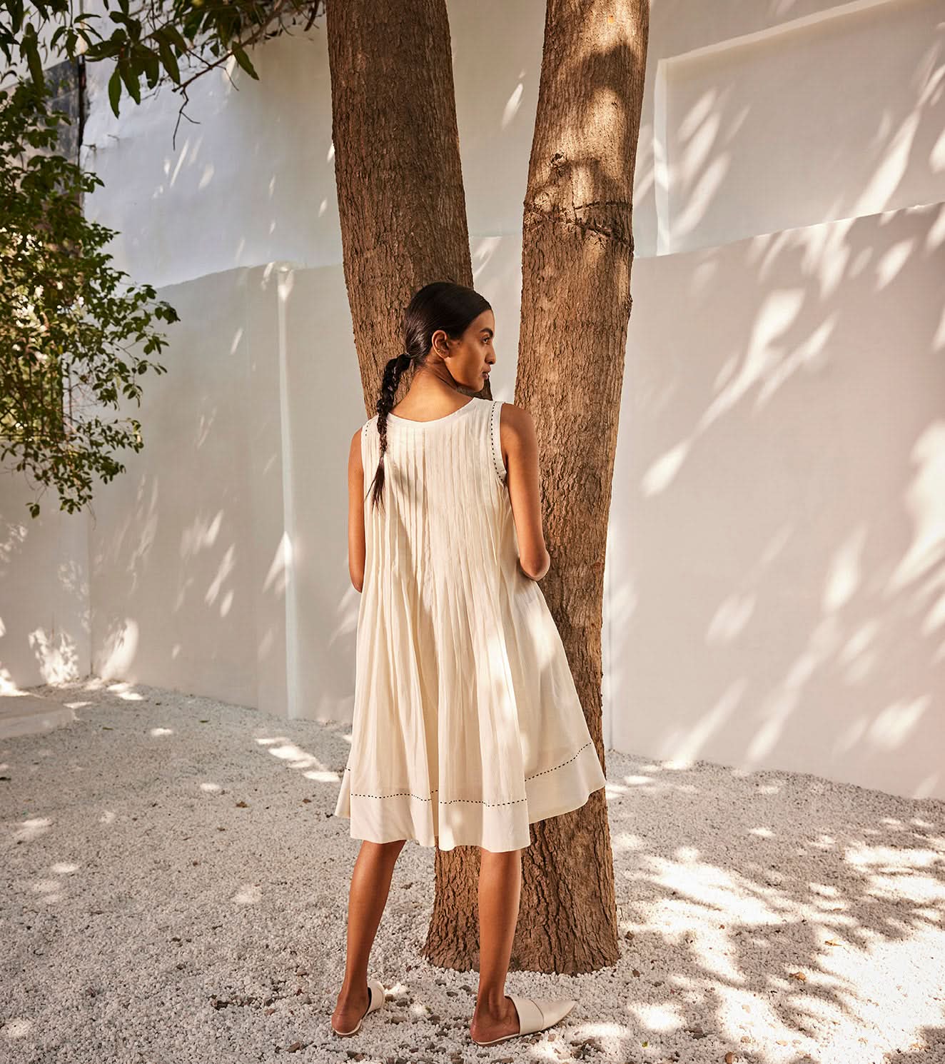 A Model Wearing White Pure Cotton White Mist Dress curated by Only Ethikal