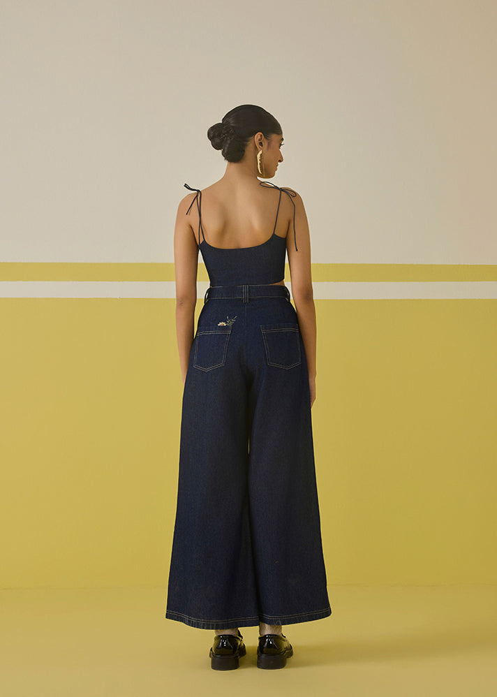 A Model Wearing Organic Cotton Denim The Daisy Denim Trousers, curated by Only Ethikal