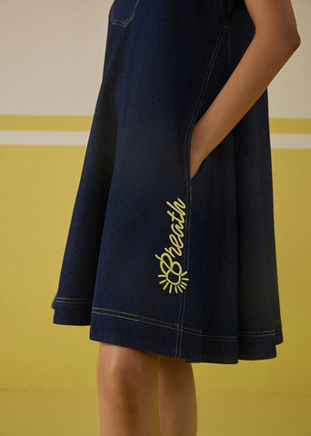 A Model Wearing Multicolor Organic Cotton Denim The Daisy Organic Cotton Denim Dress, curated by Only Ethikal