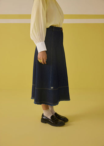 A Model Wearing Organic Cotton Denim The Sunshine Denim Skirt, curated by Only Ethikal